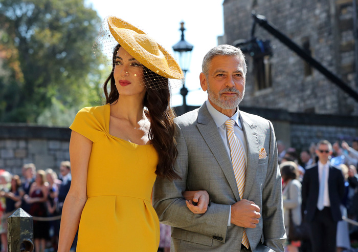 George Clooney y su esposa, arribando al evento real