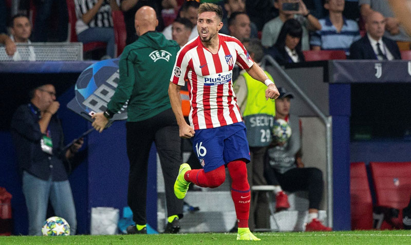 Herrera celebra un tanto con el Atlético de Madrid 