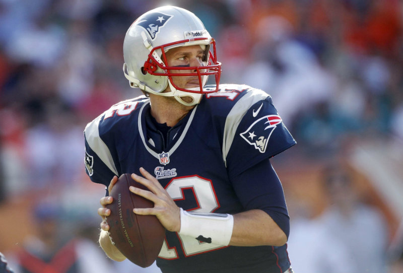 Tom Brady jugando con los Patriots