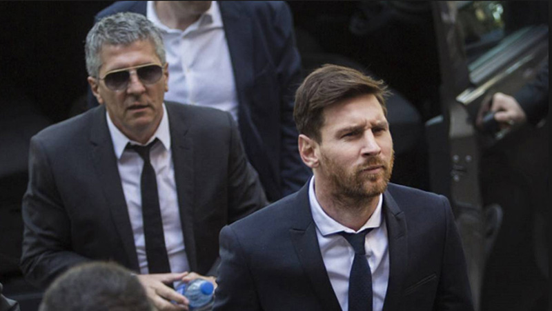 Jorge Messi y Lionel Messi tras una reunión