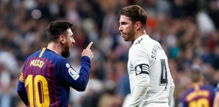 Messi y Ramos en un Clásico Español