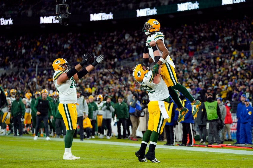 Jugadores de los Packers festejando una anotación