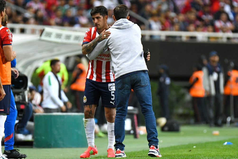 Guzmán y Veljko en el juego ante Santos