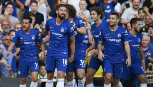 Jugadores del Chelsea festejan una anotación en Premier League