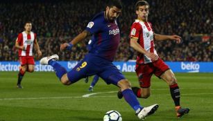 Suárez, con la marca de un elemento del Girona en La Liga 