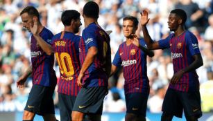Jugadores del Barça festejan un gol contra la Real Socidad