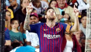 Messi celebra una anotación con el Barcelona