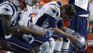 Tom Brady se lamenta en un partido de Dolphins