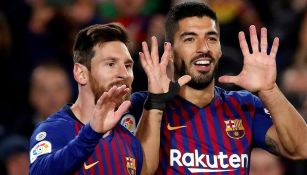 Messi y Suárez celebran una anotación ante el Eibar