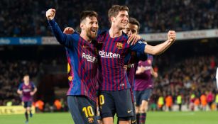 Messi y Sergi Roberto celebran un tanto en Barcelona 