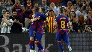 Messi y Griezmann celebrando una anotación