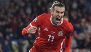 Gareth Bale festeja un gol con la selección de Gales