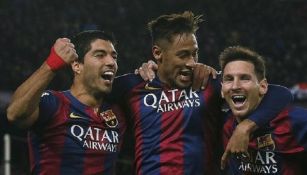 Luis Suárez, Neymar y Lionel Messi durante un juego con el Barcelona