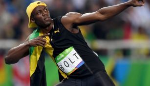 Usain Bolt celebrando después de una carrera