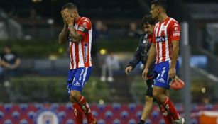 Jugadores del Atlético San Luis en lamento durante un partido