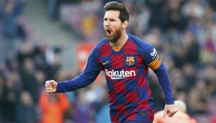 Leo Messi festeja un gol con el Barcelona