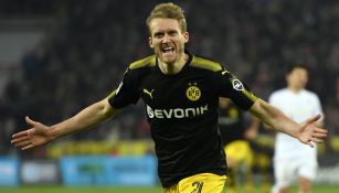 André Schürrle festeja un gol con el Borussia Dortmund 