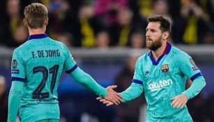 Frenkie de Jong y Messi en un duelo del Barcelona en LaLiga 