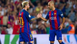 Messi junto a Mascherano en un partido del Barcelona