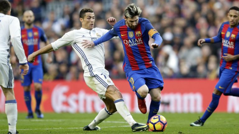 CR7 y Messi durante Clásico español