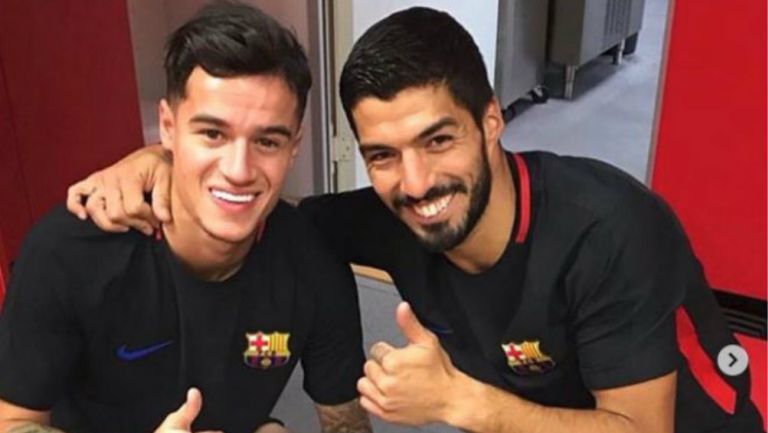 Coutinho y Suárez sonríen en el vestidor del Barcelona 