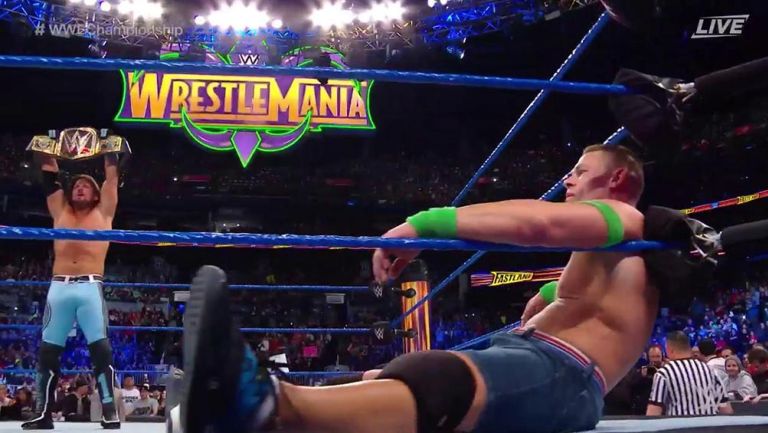 AJ Syles festeja ante un John Cena derrotado
