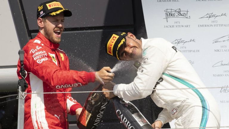 Vettel y Hamilton celebran en el podio 