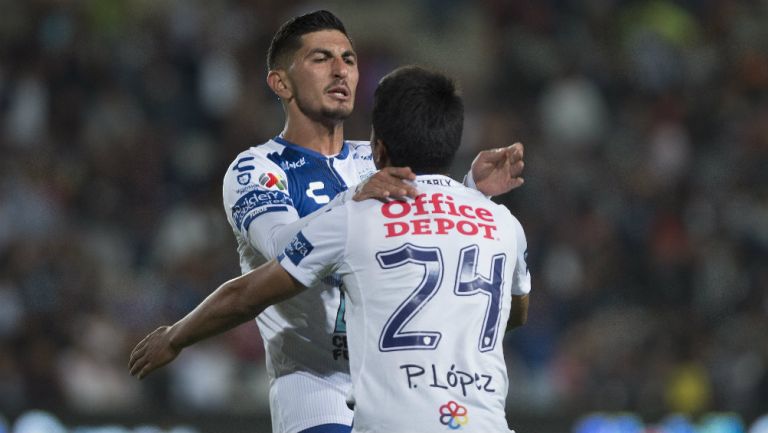 Víctor Guzmán y Pablo López festejan un gol