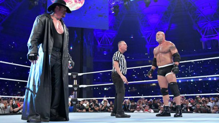 Undertaker y Goldberg antes del combate