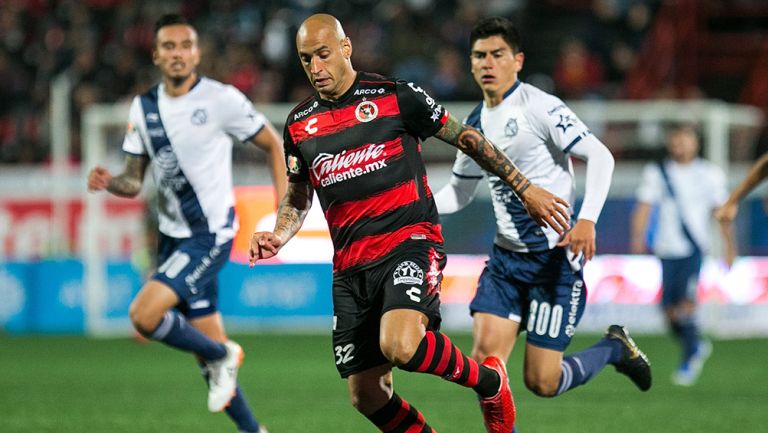 Ariel Nahuelpán, durante juego contra Puebla 